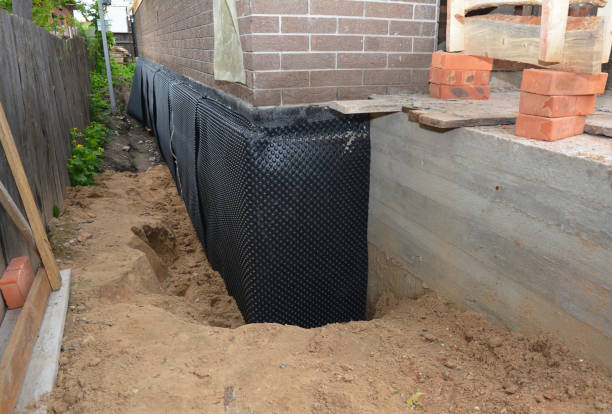 Happy homeowners after waterproofing job in Caryville